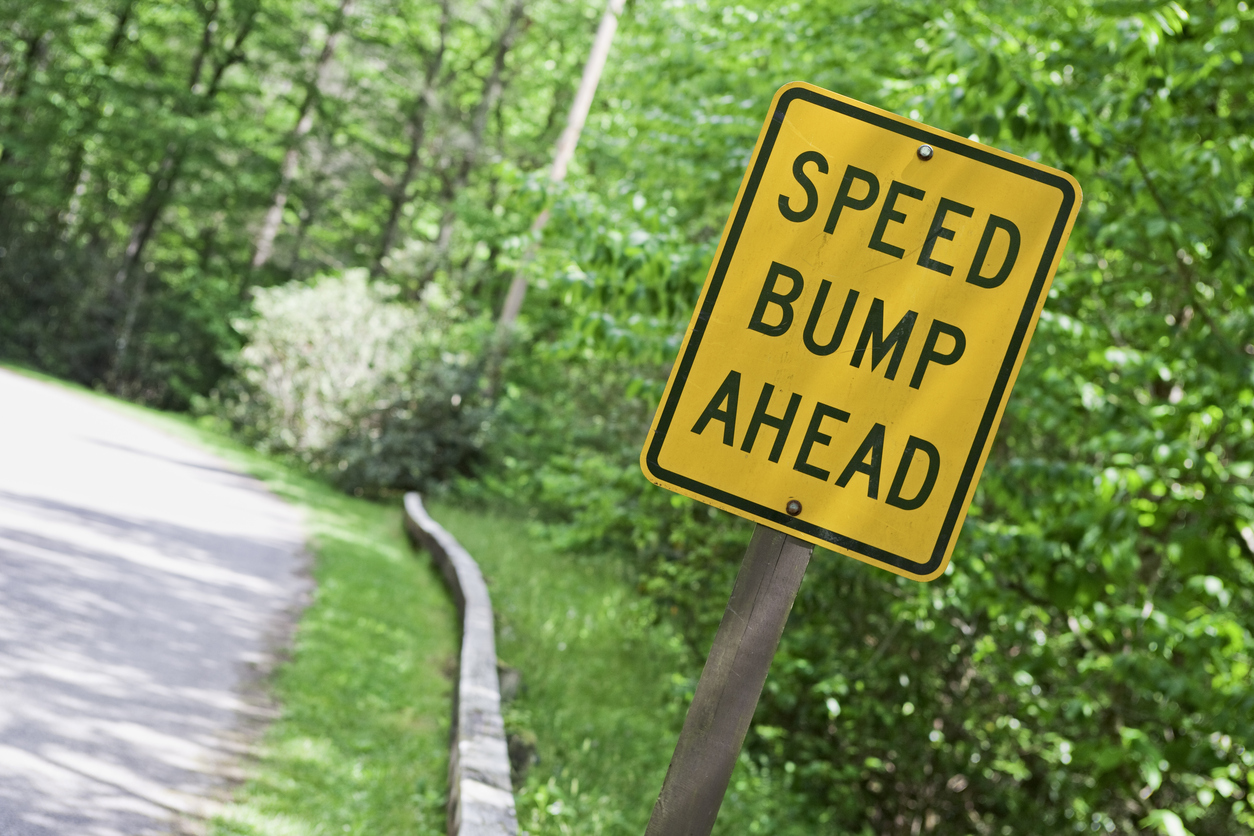 Road warning sign on a rural road.