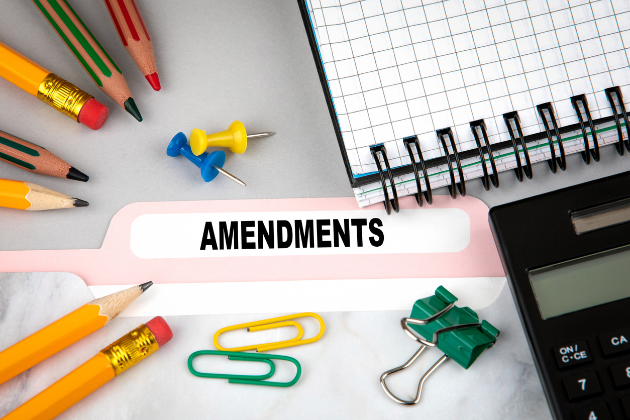 Amendments, business and law concept. Folder Register on desk